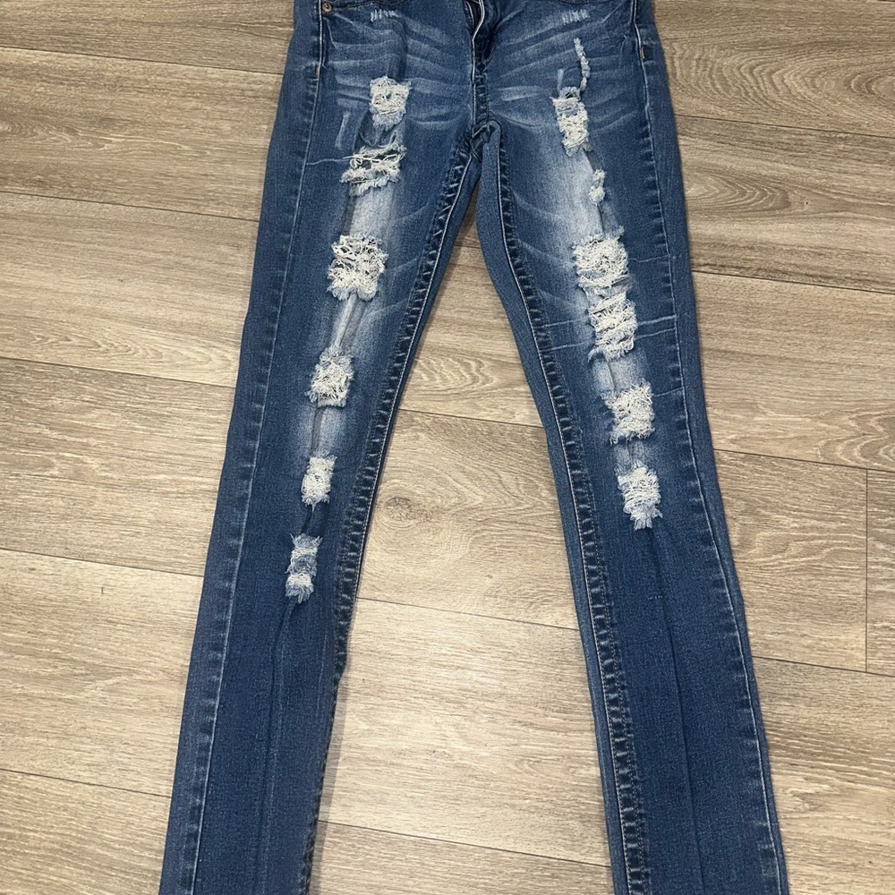 Distressed Blue Jeans